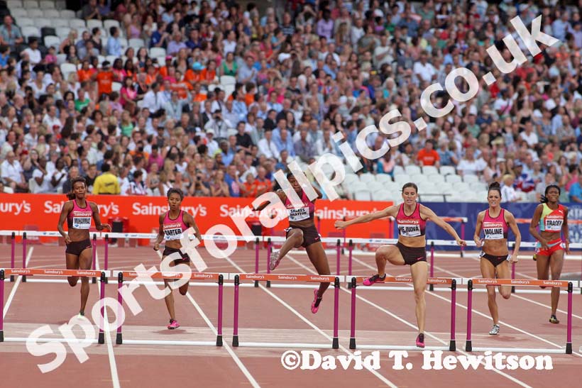 Zuzana ,Hejnova leads Perri Shakes Drayton over the final hurdles during the 400 metres hurdles,  2013 IAAF Diamond League, Sainsbury's Anniversary Games, Queen Elizabeth Olympic Park, London.